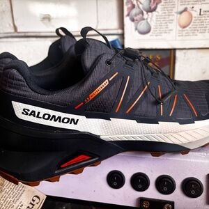 Salomon Men's Trail Shoe in Charcoal and Orange